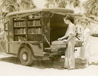 Bookmobile stopped on an unidentified beach