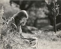 Young Woman Reading Outdoors, University of California, Santa Cruz
