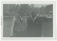 Two Men Standing Outdoors, December 1961