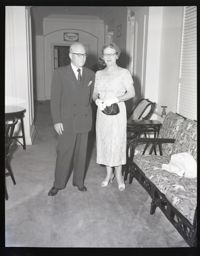 Group Photo of Man and Woman in Hallway