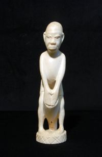 Ivory drummer carving