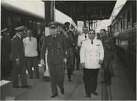 Military officials at a train station, Photograph 13