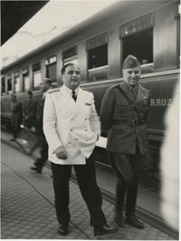 Military officials at a train station, Photograph 9