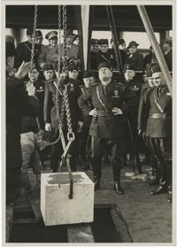 Benito Mussolini witnesses the laying of the foundation for the film industry in Rome, Italy