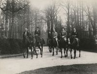 Mario Pansa and unidentified persons astride horses, Photograph 3