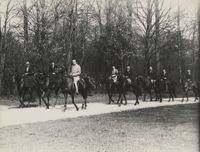Mario Pansa and unidentified persons astride horses, Photograph 5