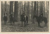 Mario Pansa and unidentified persons astride horses, Photograph 1