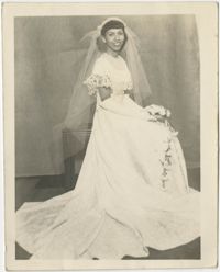 Photograph of a Woman Wearing a Wedding Gown