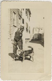 Photograph of a Man and Dog