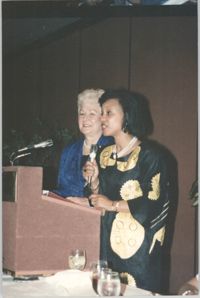 Photograph of Two Women at a Podium
