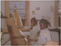 Photograph of Two Girls Painting