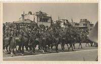 Soldiers astride horses in a military ceremony