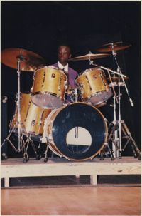Photograph of a Young Man Playing Drums