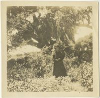 Woman in front of Live Oak tree