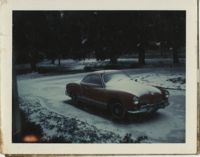 Photograph of Car in the Snow