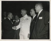 Photograph of Men Shaking Hands at 6th District Meeting of the Omega Psi Phi Fraternity Meeting