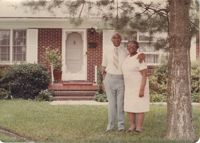 Photograph of Arthurlee Brown McFarlin and Livingston McFarlin Embracing Outside of Home