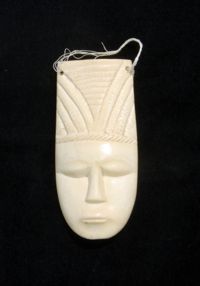 Ivory ornamental face mask