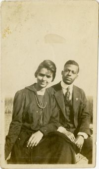 Miriam DeCosta Seabrook and Herbert U. Seabrook, Sr. sitting outside