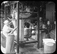 Filling and Sewing Bags of Granulated Sugar, New York City.