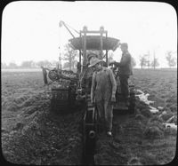Digging Ditch with Tractor and Laying Drain Tile, Wis.