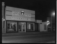 Horne Motor Co. at night