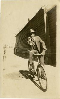 Man posing on bicycle