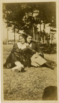 Elizabeth DeCosta Sartor and unidentified woman sitting outside