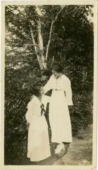 Miriam DeCosta Seabrook and unidentified woman standing outside