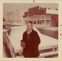 Lucille Culp with her camera on Bay Street after the snowfall