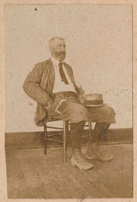 Conrad Donner sitting in chair