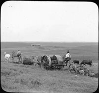 Spreading Manure and Plowing with Tractor, Nebraska.