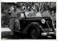 Joe Engel with someone's Mercedes, DP camp Zeilsheim, 1946
